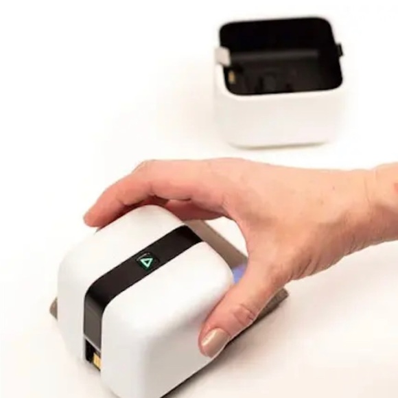 Mini printer. 
Glide, print, and make DIY designs with this handheld PrintMaker. - Picture 10 of 13